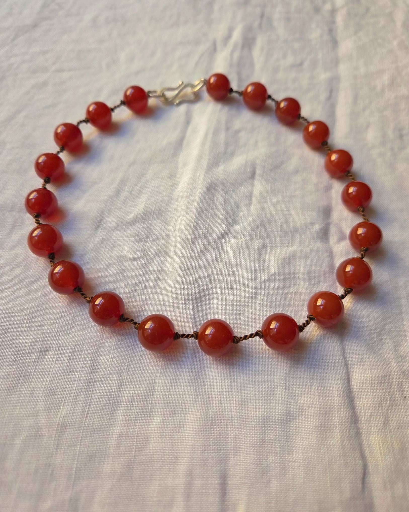 “Kurago-Tamago XV” Carnelian, Sterling Silver and Silk Necklace