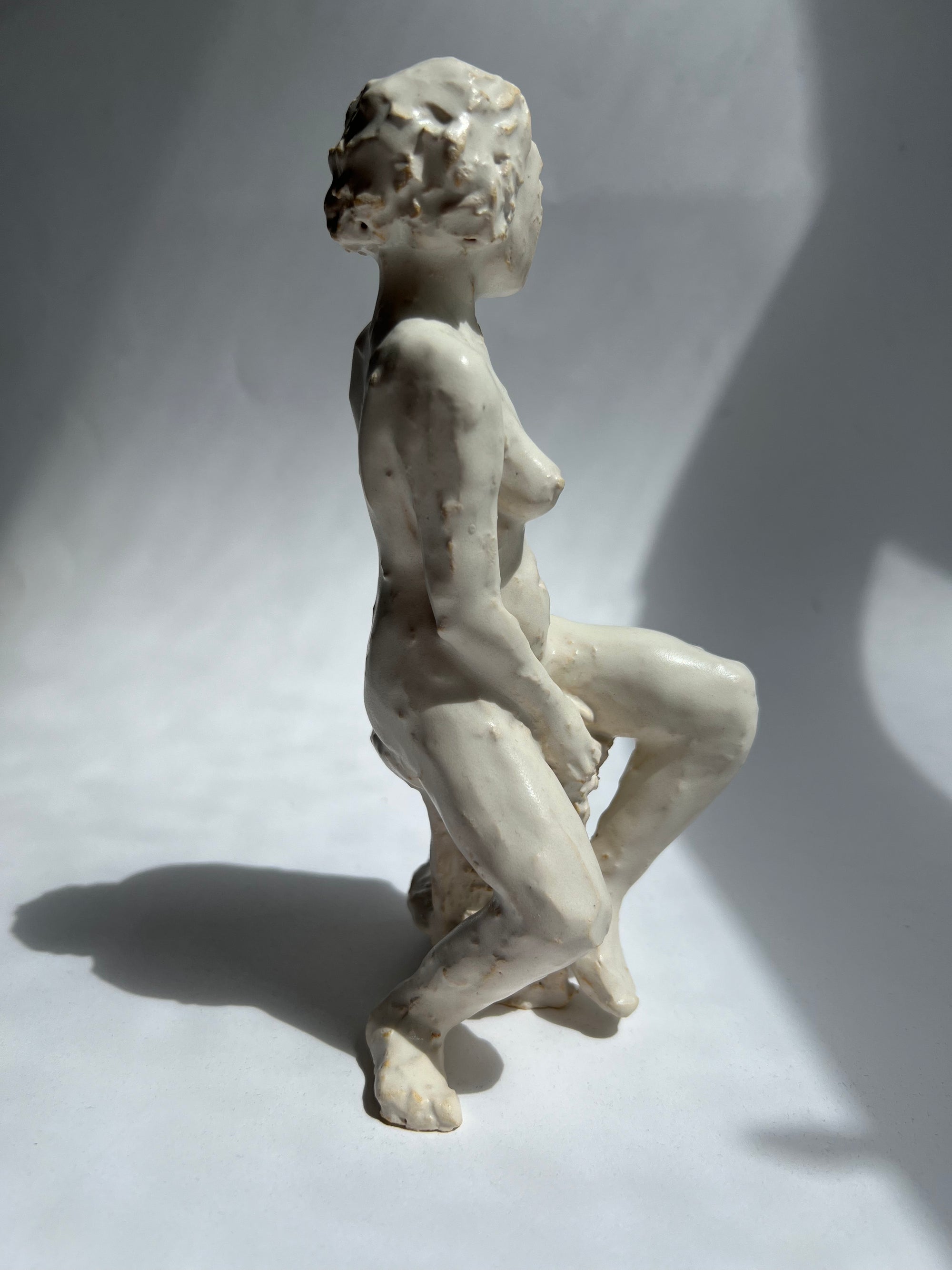 Nina Blass Figurative White Seated Sculpture