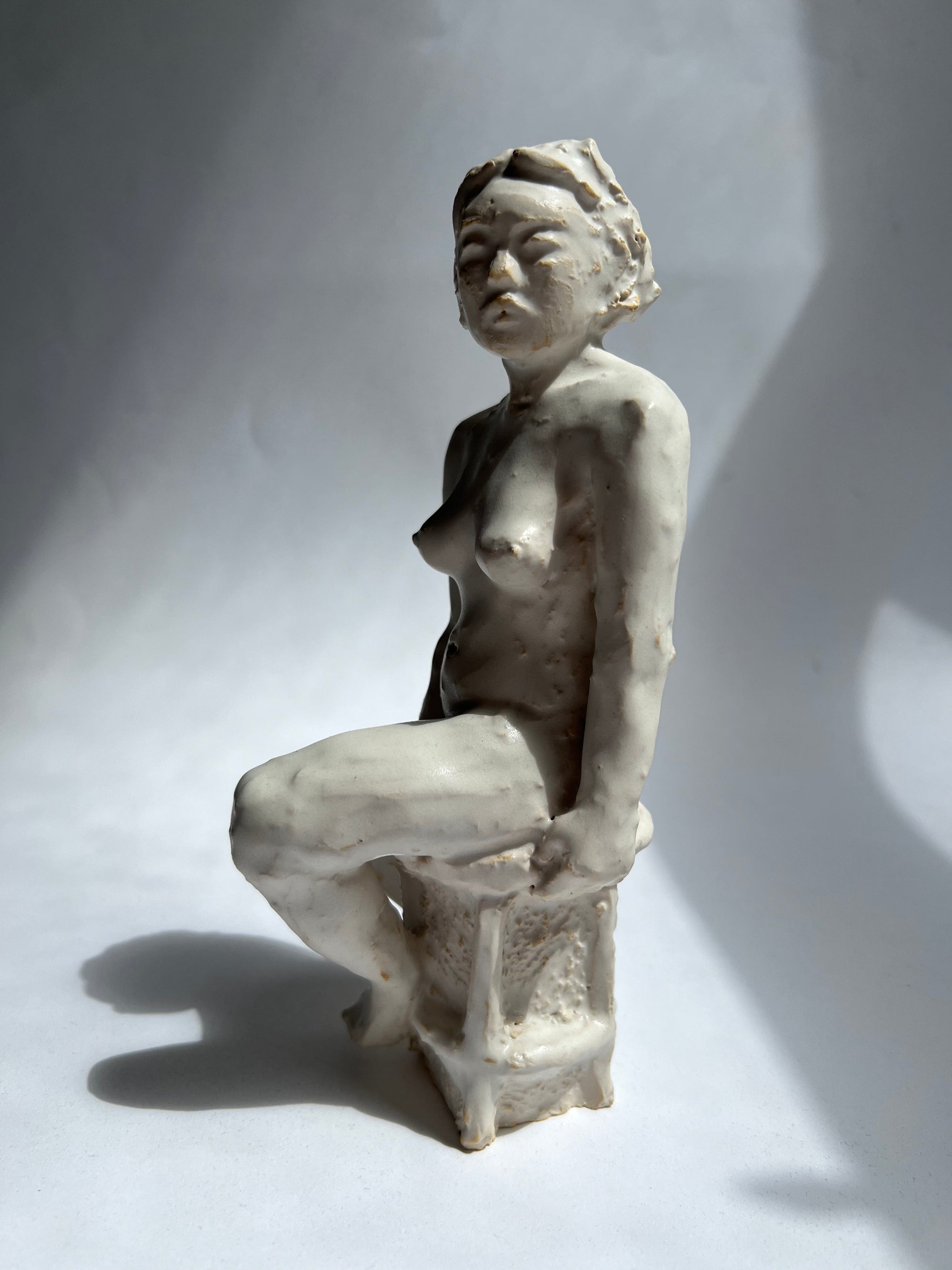 Nina Blass Figurative White Seated Sculpture