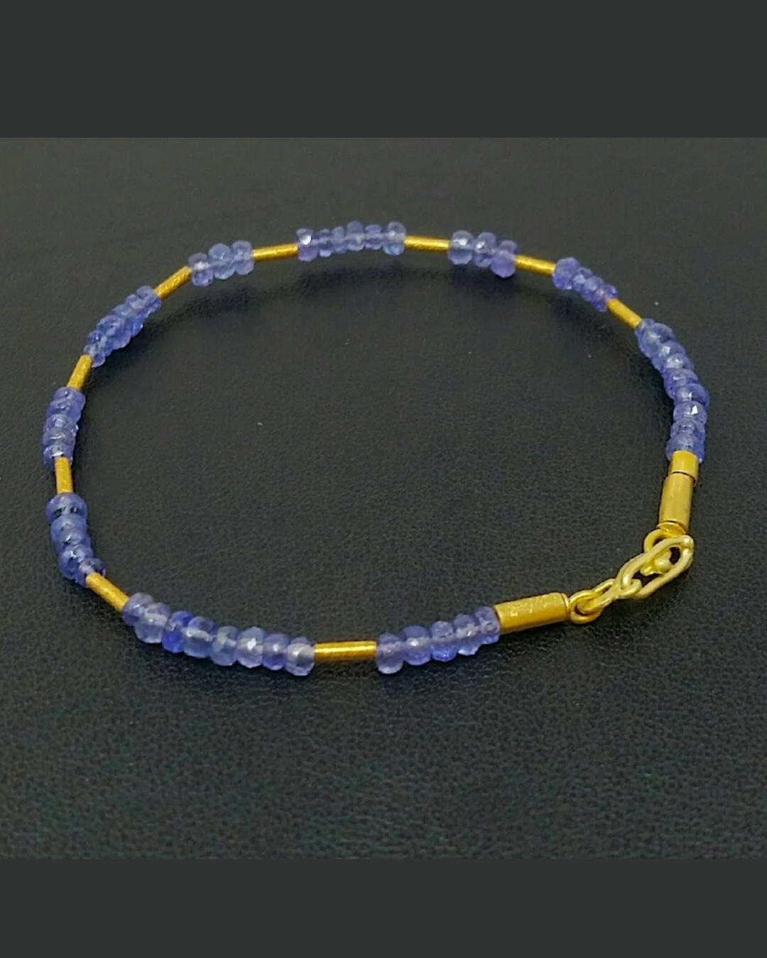"Forgiven Plums Too" Gold and Tanzanite Bracelet